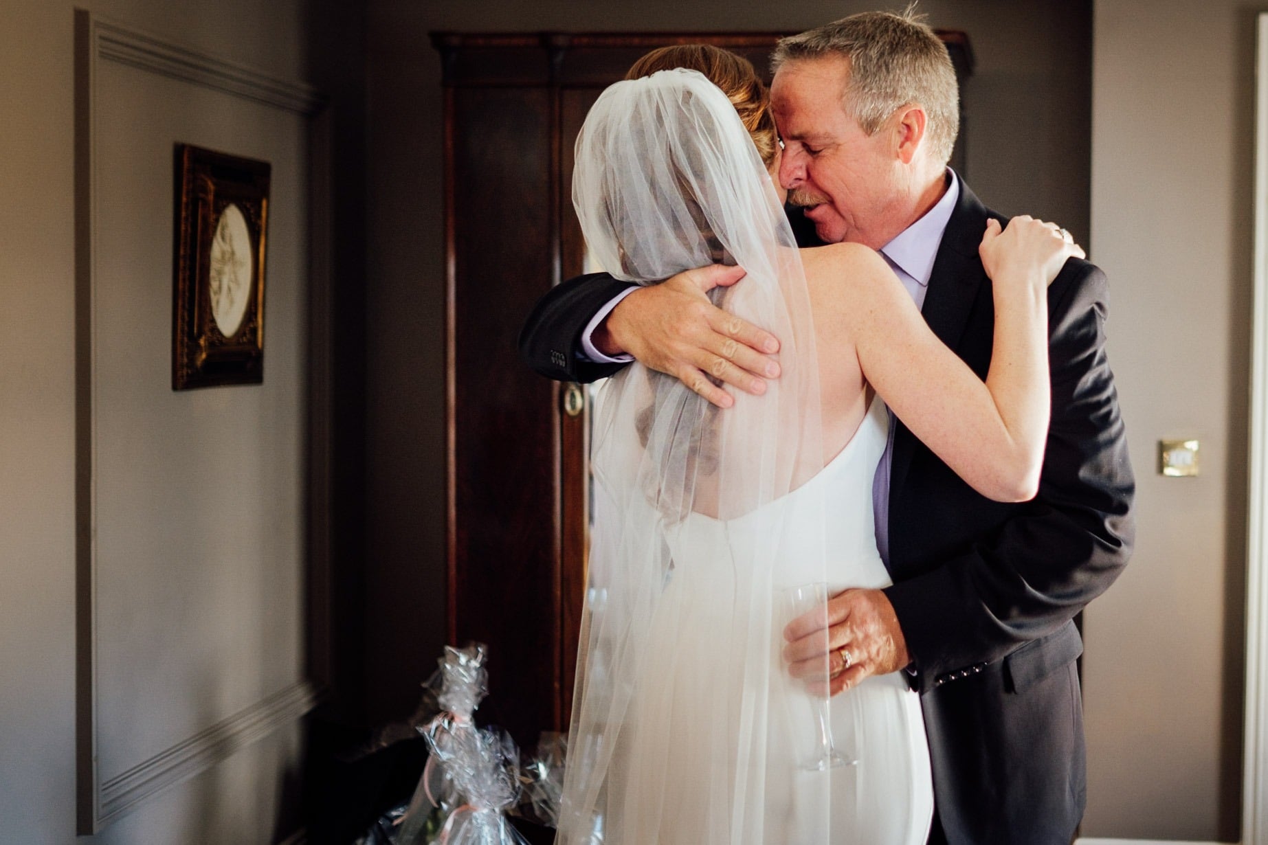 bride hugs her father