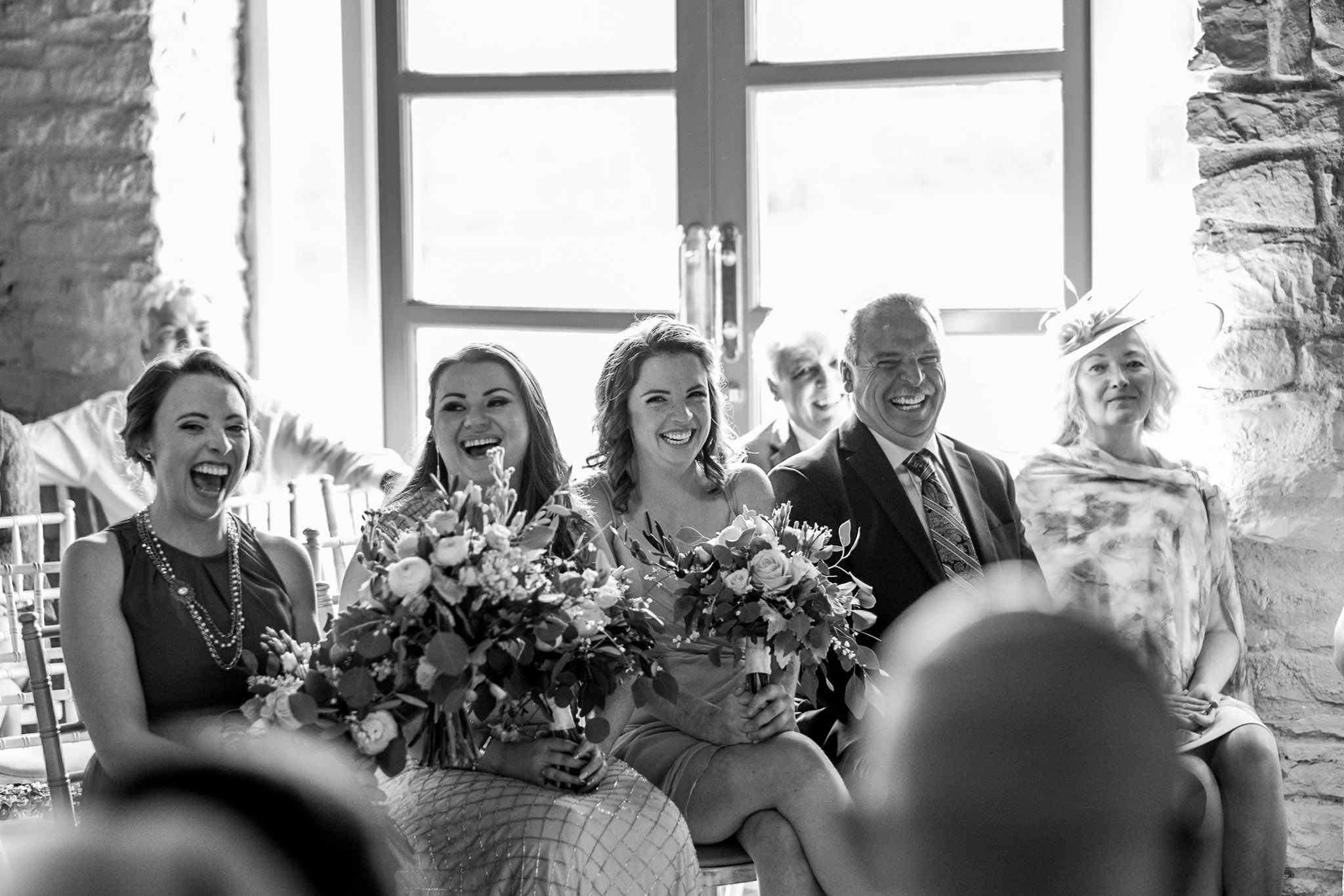 guests laughing at the wedding ceremony