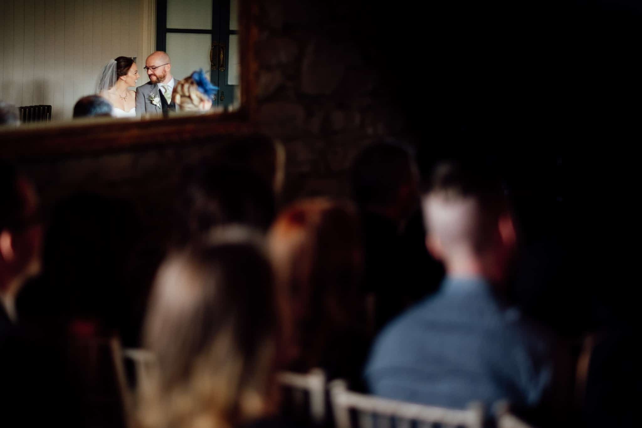 bride and groom looking at each other