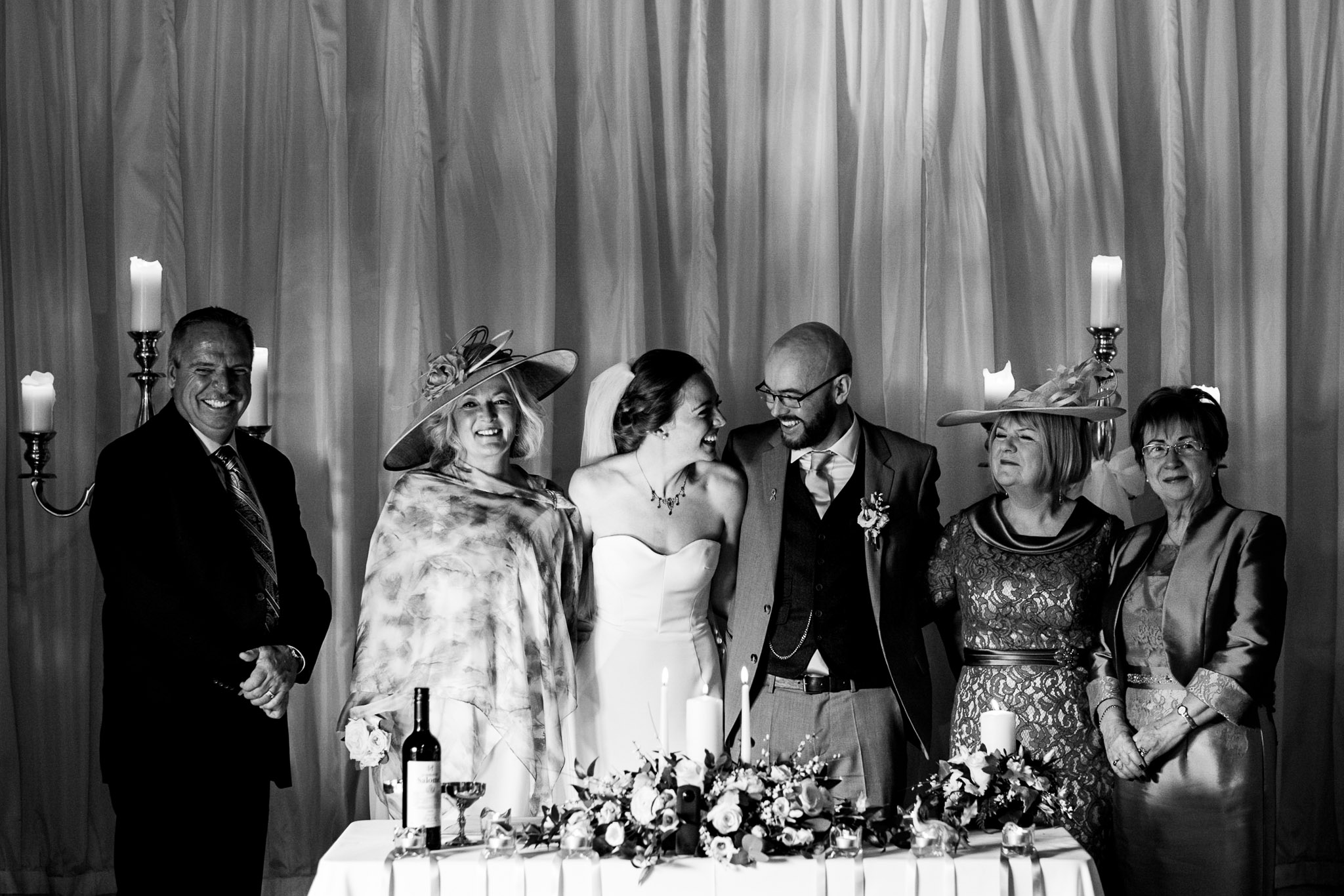 bride and groom posing for a photo during the wedding ceremony