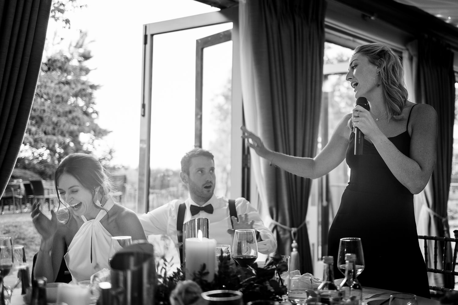 A bridesmaid makes a joke during speeches at a Bellinter House wedding