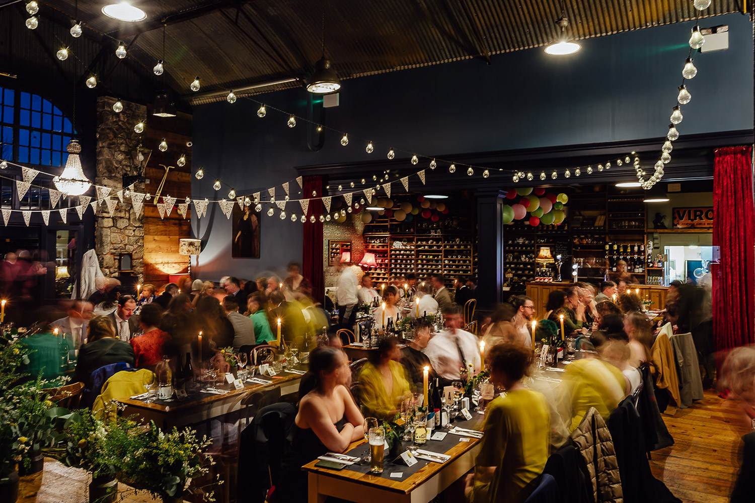 Guests sitting down waiting for their meal at Mount Druid wedding venue